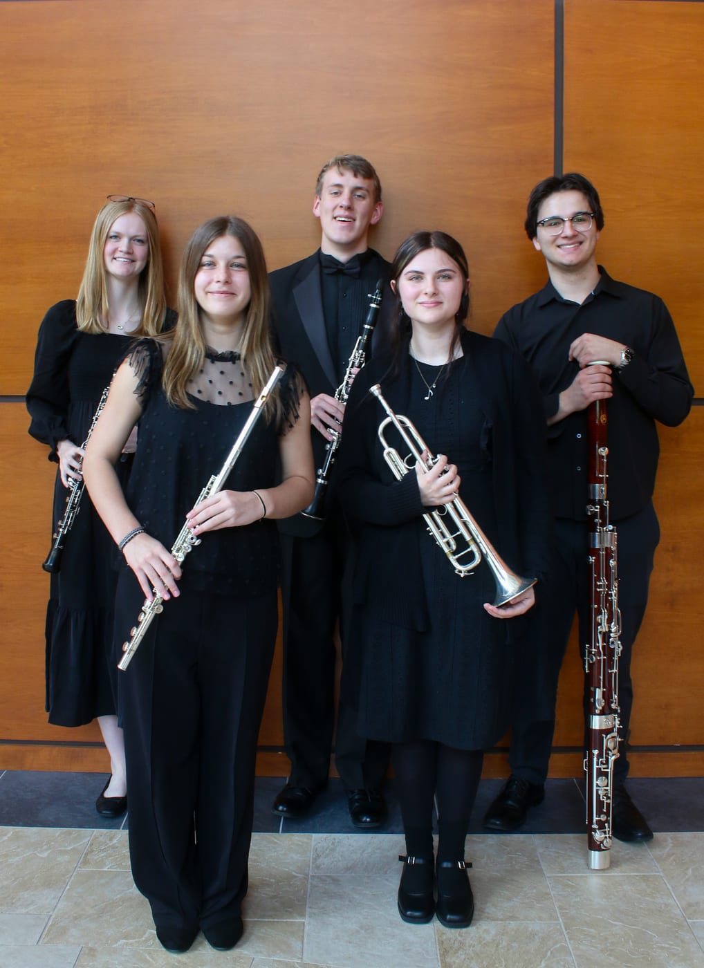 The 2025 Tara Winds scholarship recipients with their instruments